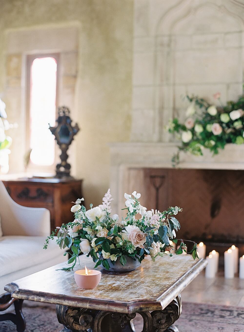 Romantic floral centerpiece in lounge at Cal-a-vie spa - Jacqueline Benét Photography