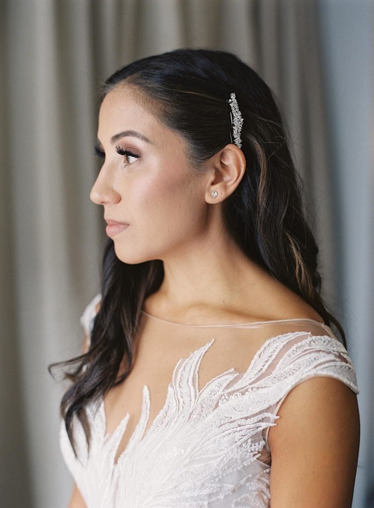 Bride with jeweled barrette and long brunette hair - Jacqueline Benét Photography