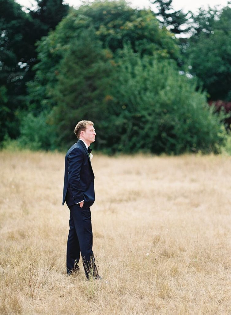 Groom waits for bride at Discovery Park - Jacqueline Benét Photography