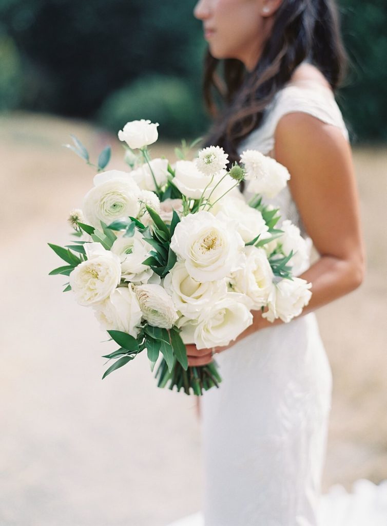 Bride with white bridal bouquet at Discovery Park - Jacqueline Benét Photography