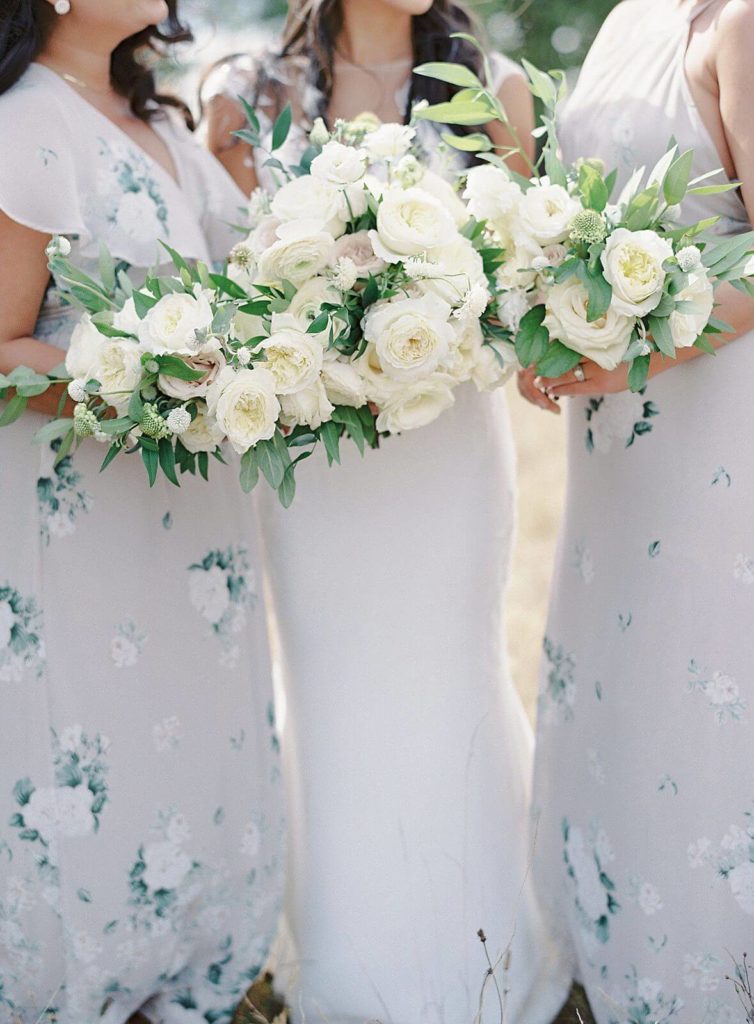 White flower bouquet by Simply by Tamara Nicole with floral lavender bridesmaids dresses - Jacqueline Benét Photography