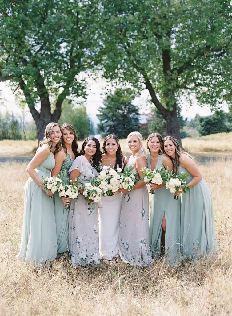 Bridesmaids and Brides in pastel green and lavender with white flowers at Discovery Park in Seattle - Jacqueline Benét Photography