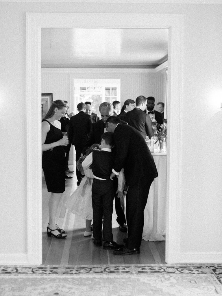Guests cocktail hour at Admirals House wedding - Jacqueline Benét Photography