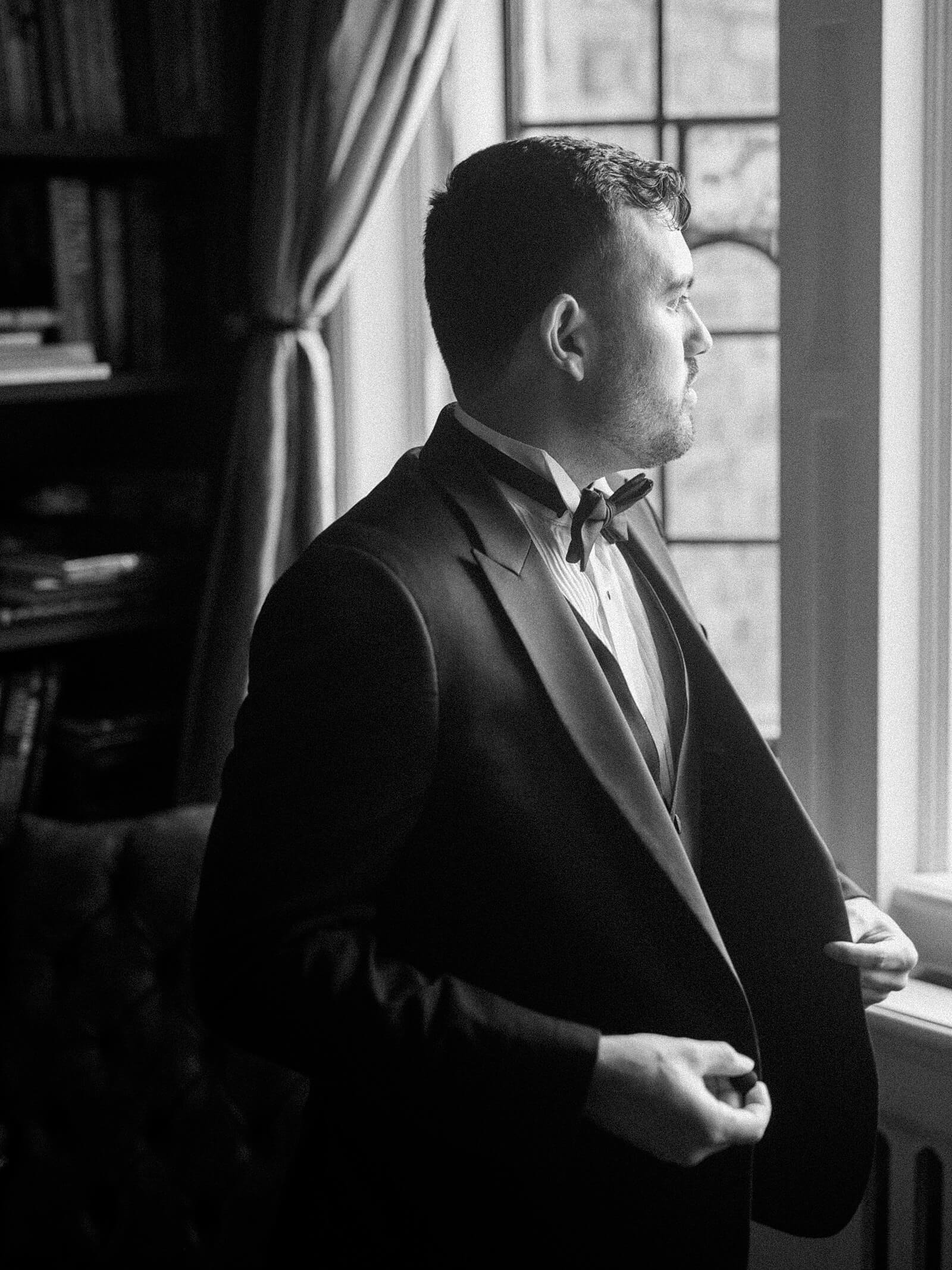 Groom getting ready at Thornewood Castle - Jacqueline Benét Photography
