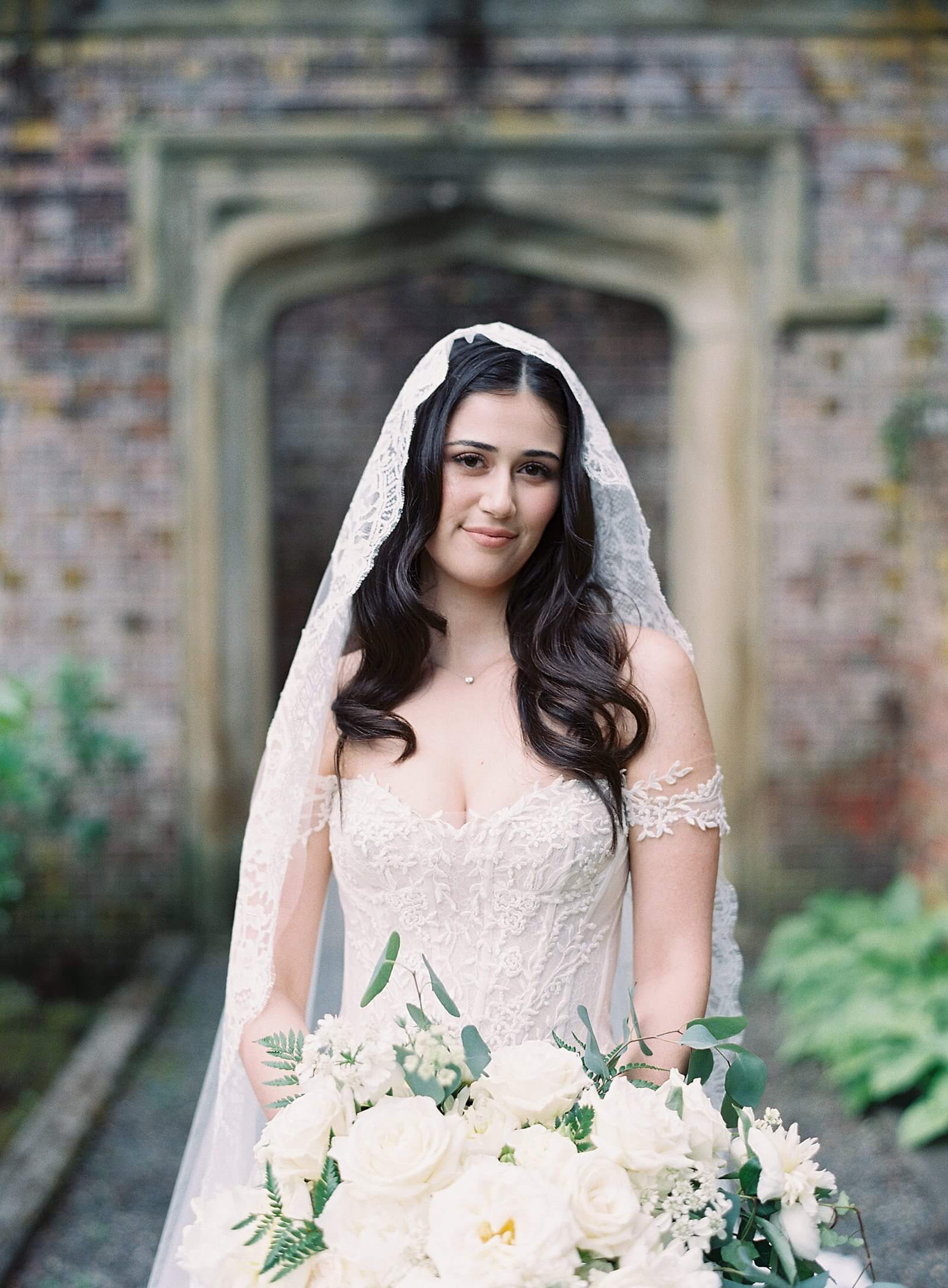Bride in mantilla lace veil at Thornewood Castle -  Jacqueline Benét Photography