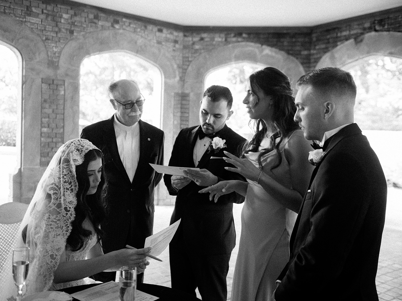 Signing of the marriage license at Thornewood Castle wedding - Jacqueline Benét Photography
