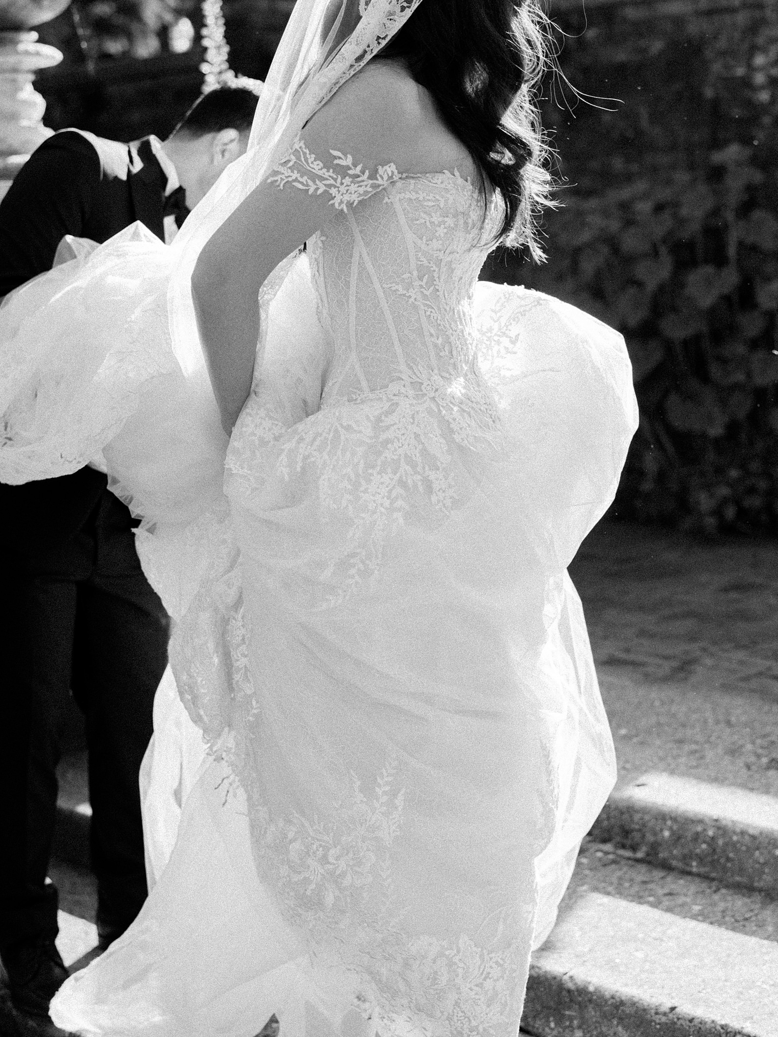 bride and groom black and white with floral applique lace ines di santo gown - Jacqueline Benét Photography