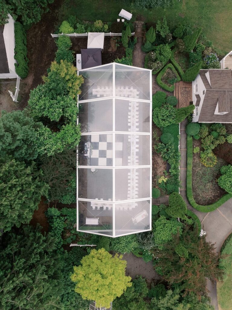 Wide shot of Fox Hollow Farm’s estate lawn and garden reception setup, captured beautifully by Jacqueline Benét | best outdoor venue in Seattle