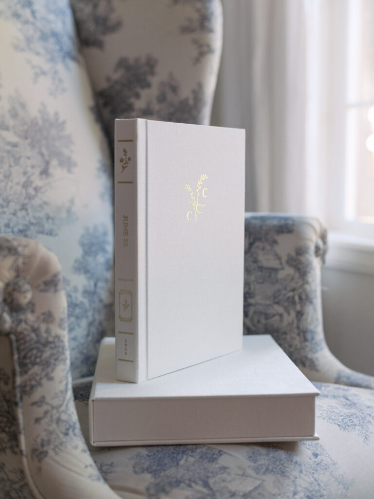 Wedding album with classic gold on white european linen